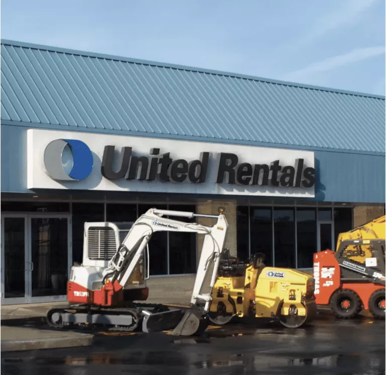 united rentals branch with equipment in the parking lot