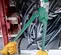 Green and silver Greenlee Cable Lug Crimping Tool, Manual