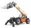 Front view of an orange and yellow JLG telehandler with extended boom, stabilizers, forklift attachment and enclosed cabin.