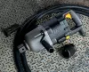 Silver and black Ingersoll Rand 1-1/2 inch drive Air Impact Wrench laying on a metal floor