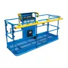 Front angled view of a blue and yellow aerial work platform with guardrails and a control panel.