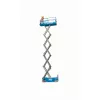 Side view of extended blue Genie scissor lift with a platform with safety rails.